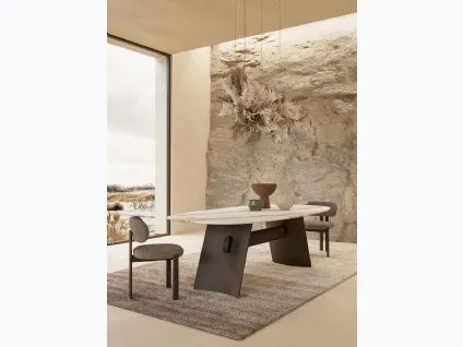 Tavolo con piano in marmo e struttura in metallo finitura bronzo Wave Nature Design